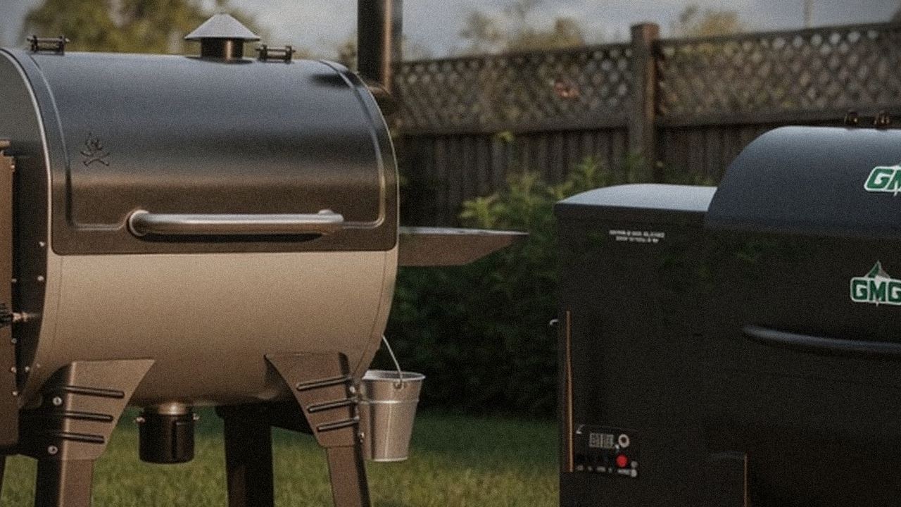 Camp Chef Woodwind WiFi 24 and Green Mountain Grills Trek starting up, controllers lit