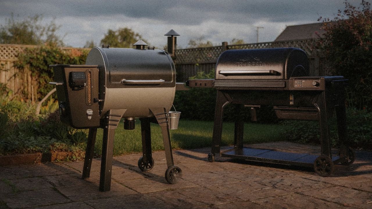 Camp Chef Woodwind Pro WiFi 24 beside Traeger Pro 780, editorial product photography