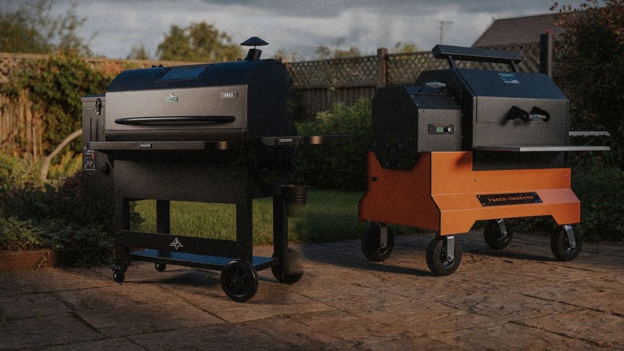Green Mountain Grills Peak standing next to Yoder Smokers YS640s, showing the size and price-tier gap